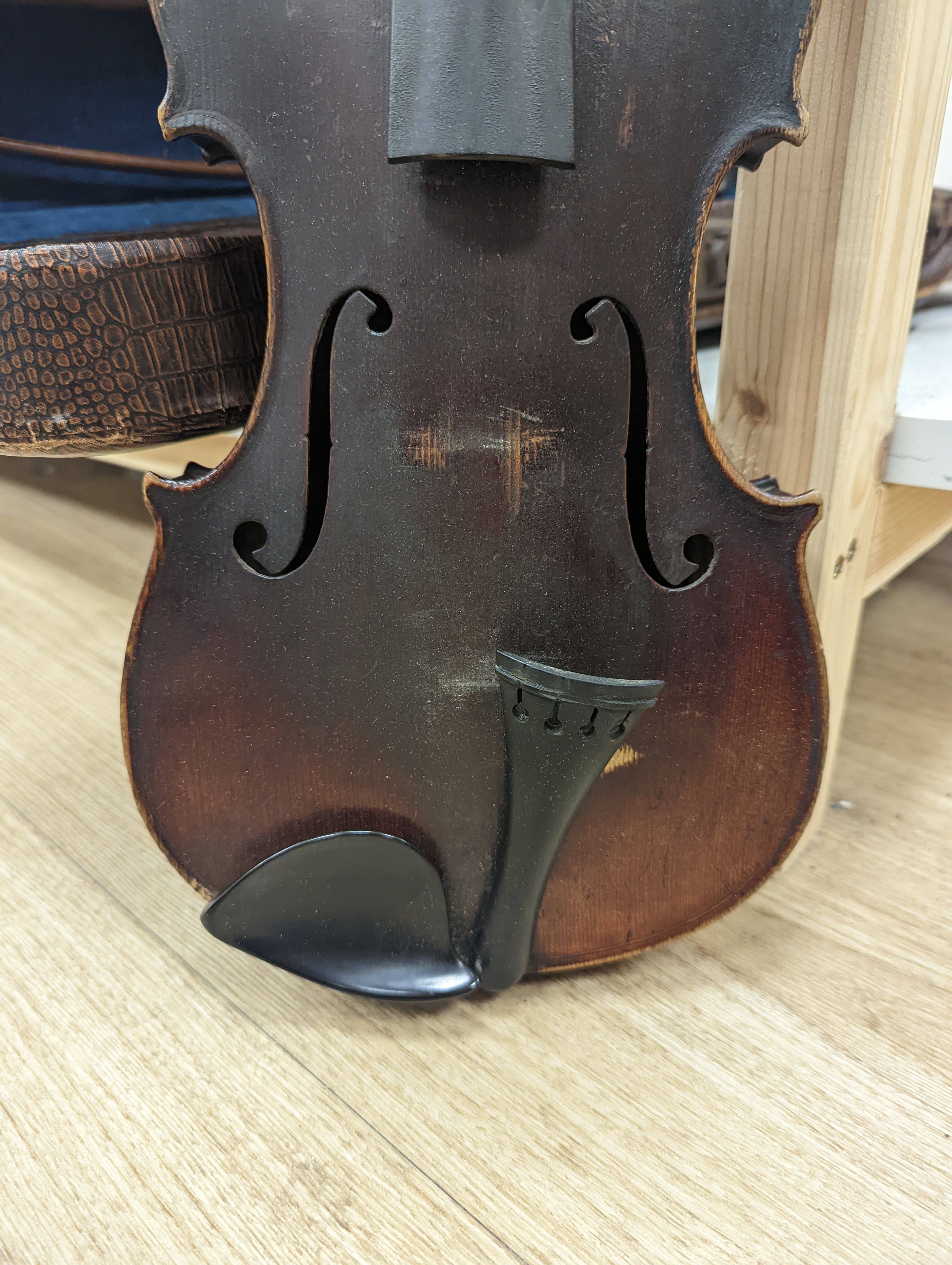 A late 19th century German violin and two bows, cased